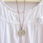 Love. Round copper necklace..