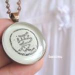 Love. Round copper necklace..