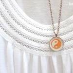 Yin yang. Round copper neck..