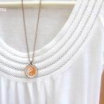 Yin yang. Round copper neck..